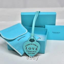 Almost unused, extremely beautiful, rare, authenticated Tiffany bag charm heart