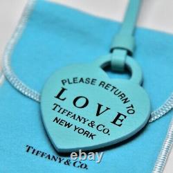 Almost unused, extremely beautiful, rare, authenticated Tiffany bag charm heart