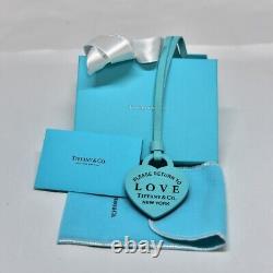 Almost unused, extremely beautiful, rare, authenticated Tiffany bag charm heart