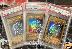 Set Of 3x PSA 8 Blue Eyes White Dragon SDK-001 YuGiOh All Have HOLO FOIL BLEED