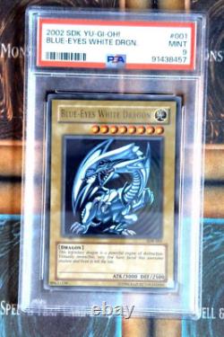 YuGiOh! TCG Blue-Eyes White Dragon SDK-001 Ultra Rare Mint PSA 9 Minor Ink error