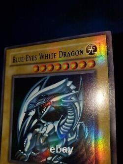 Yugioh Blue Eyes White Dragon SDK-001 Unl Holo bleed