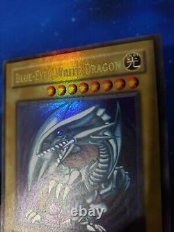 Yugioh Blue Eyes White Dragon SDK-001 Unl Holo bleed